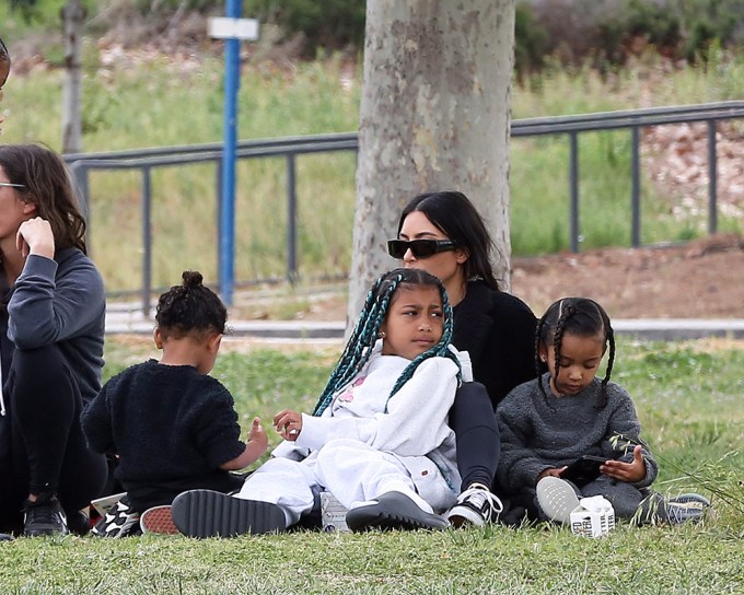 Kim Kardashian watching Saint play soccer