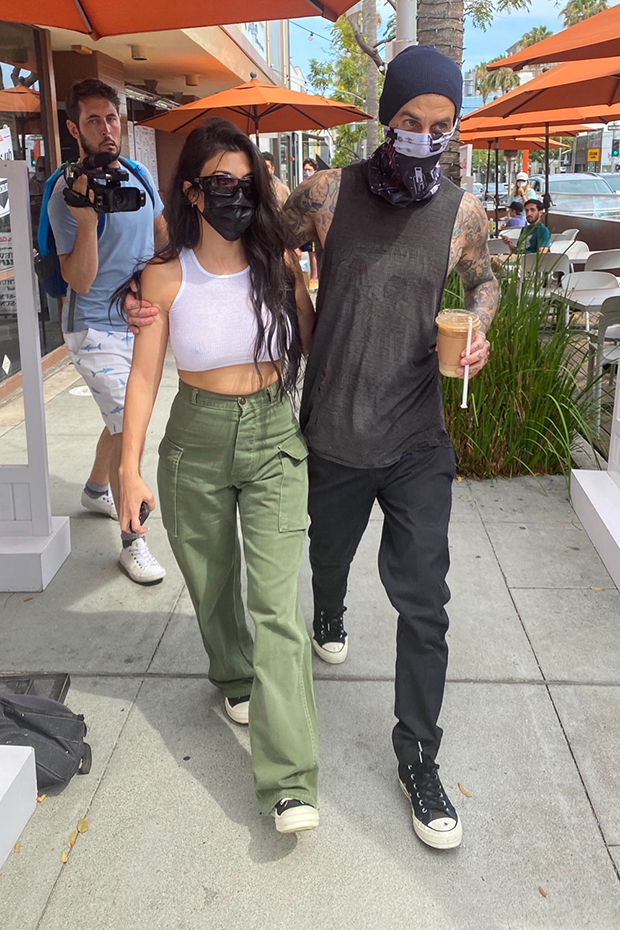 Kourtney Kardashian Rocks Plunging Top, Holds Hands With Travis Barker