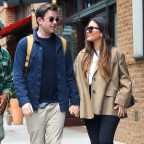 Olivia Munn and John Mulaney seen holding hands as leaving their hotel in New York City