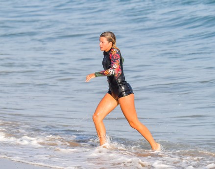 Sofia Richie shows off her curves as she heads out for a bit of paddle boarding with friends in Malibu. Sofia looked very happy to be out there with friends on the waves. she slipped a couple of times and was very close to a dolphin as she enjoyed the warm beach breeze. 16 Aug 2020 Pictured: Sofia Richie. Photo credit: Snorlax / MEGA TheMegaAgency.com +1 888 505 6342 (Mega Agency TagID: MEGA694557_026.jpg) [Photo via Mega Agency]