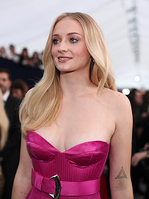 Sophie Turner Added Blunt Bangs to Her Waist-Length Red Hair – See Photo