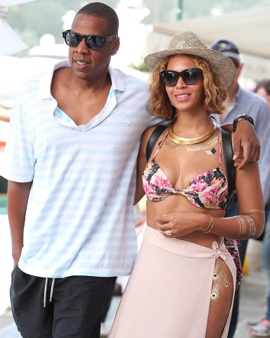 Jay-Z and wife Beyonce are seen spending a romantic day in the seaside town of Portofino, Italy. The couple are away celebrating Beyonce's 33rd birthday which was September 4th.  Pictured: Jay-Z,Shawn Carter,Beyonce,Jay-Z Shawn Carter Beyonce Ref: SPL898804 060814 NON-EXCLUSIVE Picture by: SplashNews.com  Splash News and Pictures USA: +1 310-525-5808 London: +44 (0)20 8126 1009 Berlin: +49 175 3764 166 photodesk@splashnews.com  World Rights, No Australia Rights, No Belgium Rights, No China Rights, No Denmark Rights, No Estonia Rights, No Czechia Rights, No Finland Rights, No France Rights, No Italy Rights, No Japan Rights, No Netherlands Rights, No New Zealand Rights, No Poland Rights, No Sweden Rights, No Turkey Rights