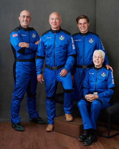 Blue Origin's New Shepard suborbital rocket remains on schedule to launch on its 16th flight to space and its first with astronauts on board on Tuesday, July 20, 2021, from Launch Site One, 160 miles east of El Paso, Texas. Founder Jeff Bezos, second from left, will be accompanied aboard the flight by his brother Mark Bezos, left, 82-year-old aviator Wally Funk, seated, and 18-year-old Oliver Daemen, right, of the Netherlands. Funk and Daemen will become the oldest and youngest people to fly in space, respectively. Daemen will also become the first paying customer Blue Origin will send into space.Blue Origin's New Shepard Rocket Prepares for First Crewed Launch, Washington, District of Columbia, United States - 20 Jul 2021