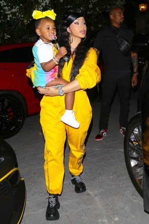 * EXCLUSIVE * Beverly Hills, CA - Cardi B and daughter Kulture were spotted in rare form as she attended Teyana Taylor's exclusive listening party for her new album titled 