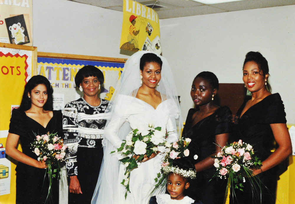 An intimate family wedding snap from the Obama wedding album. Bride Michelle Obama on her wedding day in Chicago.