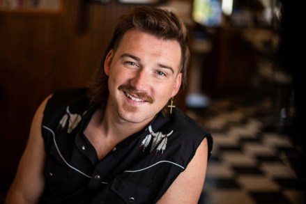 Country singer Morgan Wallen poses for a photo after getting a mullet at Paul Moll Barber Shop in New York.  Walen, who grabbed everyone's attention with his soulful hit song "whiskey glasses," Said he decided to try a mullet after seeing old pictures of his father proudly rocking the hairstyle Morgan Wallen Portrait Session, New York, USA - August 27, 2019
