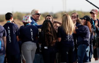Virgin Galactic founder Richard Branson is greeted by school children before heading to board the rocket plane that will fly him to the edge of space from Spaceport America near Truth or Consequences, New Mexico
Virgin Galactic Branson, Truth or Consequences, United States - 11 Jul 2021