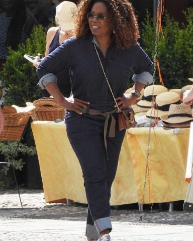 Portofino, ITALY  - *EXCLUSIVE*  - Girls Trip!  The TV Talk Show Queen Oprah Winfrey sports a denim jumpsuit with Louis Vuitton bag out in the Italian sunshine as she's pictured with BFF Gayle King during her European break in Portofino. The former talk show host seems to be enjoying the trip and was recently spotted enjoying an afternoon with Jeff Bezos aboard his luxxury super yacht!

Oprah was seen with friends Including bestie Gayle King as she stepped off her boat onto shore for a visit to the old fishing town famed for its high-end boutiques and seafood restaurants. 

Oprah visited a few shops and stopped to enjoy a little fine Italian dining, al fresco style with her pals, and even took a few selfie snaps at the dining table.

Pictured: Oprah Winfrey

BACKGRID USA 29 JULY 2023 

BYLINE MUST READ: Cobra Team / BACKGRID

USA: +1 310 798 9111 / usasales@backgrid.com

UK: +44 208 344 2007 / uksales@backgrid.com

*UK Clients - Pictures Containing Children
Please Pixelate Face Prior To Publication*