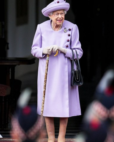 Her Majesty Queen Elizabeth II attends an Armed Forces Act of Loyalty Parade in the gardens of the Palace of Holyroodhouse in Edinburgh, UK, 28 June 2022. 
The armed forces, represented by the Service Cadets, Band of the Royal Marines Scotland and the Pipes and Drums of the Royal Regiment of Scotland, conducted a parade and presented The Queen with the key for Edinburgh Castle. The event was an opportunity for the armed forces to mark Her Majesty's Platinum Jubilee in Scotland.
Armed Forces Act of Loyalty Parade, Palace of Holyroodhouse, Edinburgh, Scotland, UK - 28 Jun 2022
Her Majesty The Queen will attend an Armed Forces Act of Loyalty Parade in the gardens of the Palace of Holyroodhouse. The event will be an opportunity for the Armed Forces to mark Her Majesty's Platinum Jubilee in Scotland, and pay tribute to The Queen's role as Head of the UK Armed Forces. Her Majesty's Armed Forces will conduct a Parade and Presentation of the Key for Edinburgh Castle in the gardens of the Palace of Holyroodhouse. All three services will be represented on parade, with each of the single service Senior Representatives in Scotland present, together with Service Cadets. Musical support will be provided by the Band of the Royal Marines Scotland and the Pipes and Drums of The Royal Regiment of Scotland.