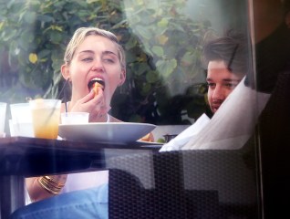 Miley Cyrus Chomps on French Fries While Eating Poolside in Miami with Boyfriend Patrick Schwarzenegger.Pictured: Miley Cyrus
Ref: SPL905034 051214 NON-EXCLUSIVE
Picture by: SplashNews.comSplash News and Pictures
USA: +1 310-525-5808
London: +44 (0)20 8126 1009
Berlin: +49 175 3764 166
photodesk@splashnews.comWorld Rights