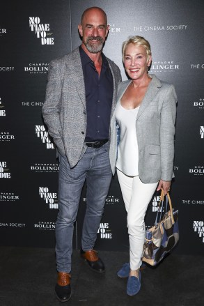 Actor Christopher Meloni, left, and his wife Sherman Williams, right, attend a special screening of "no time to die" Champagne at the iPic Theater in New York NY Special Screening Hosted by Bollinger and The Cinema Society "no time to die"New York, United States - 07 October 2021