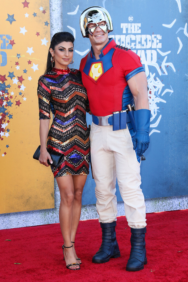 John Cena & Wife Shay Shariatzadeh Passionately Kiss At ‘Suicide Squad