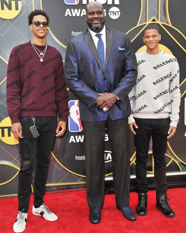 KILL NOTICEMandatory Credit: Photo by Richard Shotwell/Invision/AP/Shutterstock (10320739u)Shaquille O'Neal, Shareef O'Neal, Shaqir O'Neal. Shaquille O'Neal, center, and sons Shareef O'Neal, left, and Shaqir O'Neal arrive at the NBA Awards, at the Barker Hangar in Santa Monica, Calif2019 NBA Awards - Arrivals, Santa Monica, USA - 24 Jun 2019KILL NOTICE - This images has been withdrawn. Please remove all copies and do not publish.