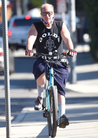 EXCLUSIVE: Andrew Dice Clay rides his bicycle through the streets of L.A. in his Studio City neighborhood on Saturday. Dice and Rosanne Barr will be going on a stand-up comedy tour together later this year or next. 05 Jun 2021 Pictured: Andrew Dice Clay rides his bicycle through the streets of L.A. Photo credit: GAC / MEGA TheMegaAgency.com +1 888 505 6342 (Mega Agency TagID: MEGA760333_004.jpg) [Photo via Mega Agency]