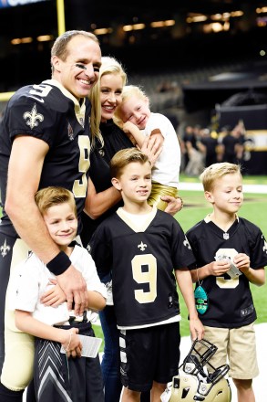 New Orleans Saints quarterback Drew Brees (9) poses for a photo with his wife Brittany and children Callen, left, Baylen, Bowen, right, and daughter Rylen, before an NFL preseason football game against the Arizona Cardinals in New Orleans
Cardinals Saints Football, New Orleans, USA - 17 Aug 2018