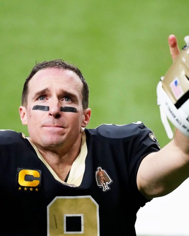 New Orleans Saints quarterback Drew Brees gestures to his family and fans after an NFL divisional round playoff football game against the Tampa Bay Buccaneers, in New Orleans. The Buccaneers won 30-20
Buccaneers Saints Football, New Orleans, United States - 17 Jan 2021