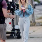 Kaley Cuoco films a scene where she gets hit by a car filming “Meet Cute” with Pete Davidson.