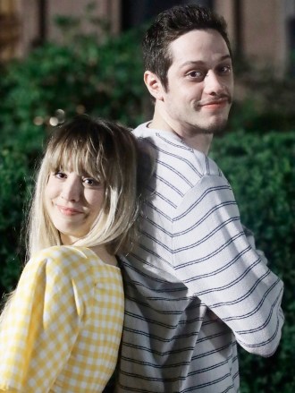 EXCLUSIVE: Kaley Cuoco Showing amazing chemistry posing for a photo in-between takes of Alex Lehmann's new film "MEET CUTE." The story is based on the concept of "What would you do if you could travel to your loved one's past and heal their wounds and make a perfect partner.". 15 Aug 2021 Pictured: PETE DAVIDSON, KALEY CUOCO Filming "Meet Cute.". Photo credit: SteveSands/NewYorkNewswire/MEGA TheMegaAgency.com +1 888 505 6342 (Mega Agency TagID: MEGA778750_001.jpg) [Photo via Mega Agency]