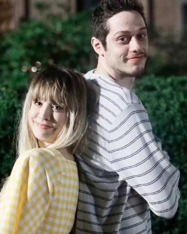 EXCLUSIVE: Kaley Cuoco Showing amazing chemistry posing for a photo in-between takes of Alex Lehmann's new film "MEET CUTE." The story is based on the concept of "What would you do if you could travel to your loved one's past and heal their wounds and make a perfect partner.". 15 Aug 2021 Pictured: PETE DAVIDSON, KALEY CUOCO Filming "Meet Cute.". Photo credit: SteveSands/NewYorkNewswire/MEGA TheMegaAgency.com +1 888 505 6342 (Mega Agency TagID: MEGA778750_001.jpg) [Photo via Mega Agency]