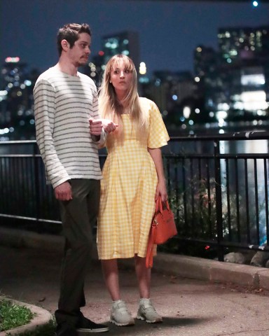 Pete Davidson and Kaley Cuoco filming “Meet Cute.”. 24 Aug 2021 Pictured: Pete Davidson and Kaley Cuoco. Photo credit: SteveSands/NewYorkNewswire/MEGA TheMegaAgency.com +1 888 505 6342 (Mega Agency TagID: MEGA781095_017.jpg) [Photo via Mega Agency]