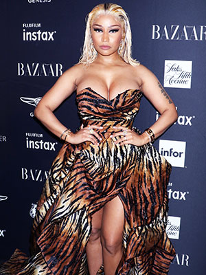 Nicki Minaj Burns The Oomph Game Wearing Louis Vuitton Jacket