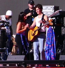 Camila Cabello and Shawn Mendes share multiple kisses as they laugh as stagehand keeps building the set during their romantic soundcheck as fans join in on the laughs as they perform at Global Citizens in the hot sun day before massive event in Central Park in New York City. The pop star brought out her boyfriend to sing their hit song "Señorita" together in the hot sun and as the pair at times even stared at the stage hand who went about his business to complete making the massive stage. 24 Sep 2021 Pictured: Camila Cabello, Shawn Mendes. Photo credit: Brian Prahl/MEGA TheMegaAgency.com +1 888 505 6342 (Mega Agency TagID: MEGA790212_004.jpg) [Photo via Mega Agency]