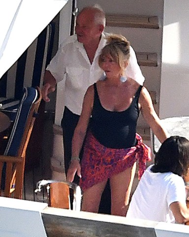 Nerano, ITALY  - *EXCLUSIVE*  -  It's a family affair for the American Actress Kate Hudson on her family trip to Nerano, Italy.  Kate enjoyed a spot of lunch at "Lo Scoglio" restaurant and was joined by her husband Danny Fujikawa, mother Goldie Hawn and Kurt Russell.  It would seem the gang enjoyed a little fine Italian dining out on their European trip and with the sun blazing. the family were spotted out on the luxurious boat as Kate donned her sexy pink bikini taking in the hot Italian rays.  Pictured: Goldie Hawn  BACKGRID USA 11 JULY 2022   BYLINE MUST READ: COBRA TEAM / BACKGRID  USA: +1 310 798 9111 / usasales@backgrid.com  UK: +44 208 344 2007 / uksales@backgrid.com  *UK Clients - Pictures Containing Children Please Pixelate Face Prior To Publication*