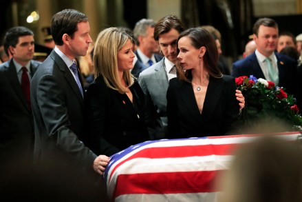 Jenna Bush Hager, Henry Hager, Barbara Bush, Craig Coyne. Jenna Bush Hager, second from left, her husband Henry Hager, left, her twin sister Barbara Bush, right, and Barbara's husband Craig Coyne, second from right, gather around the flag-draped casket of their grandfather, former President George H.W. Bush as he lie in state at the U.S. Capitol in Washington
George HW Bush, Washington, USA - 04 Dec 2018