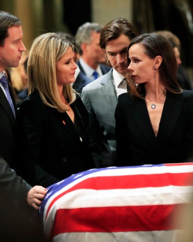 Jenna Bush Hager, Henry Hager, Barbara Bush, Craig Coyne. Jenna Bush Hager, second from left, her husband Henry Hager, left, her twin sister Barbara Bush, right, and Barbara's husband Craig Coyne, second from right, gather around the flag-draped casket of their grandfather, former President George H.W. Bush as he lie in state at the U.S. Capitol in Washington
George HW Bush, Washington, USA - 04 Dec 2018