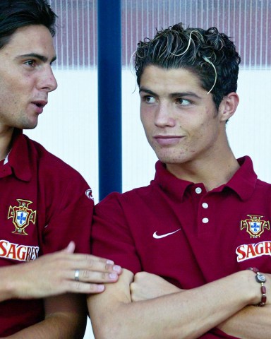 Cristiano Ronaldo, Helder Postiga Portugal's Cristiano Ronaldo, right, listens to teammate Helder Postiga before their friendly soccer match with Kazakhstan in Chaves, Portugal. It was Ronaldo's first match with the national team and he was 18 years old. Ronaldo is poised to make his 100th international appearance when Portugal meets Northern Ireland in a World Cup qualifier
Portugal Ronaldo Soccer, Chaves, Portugal