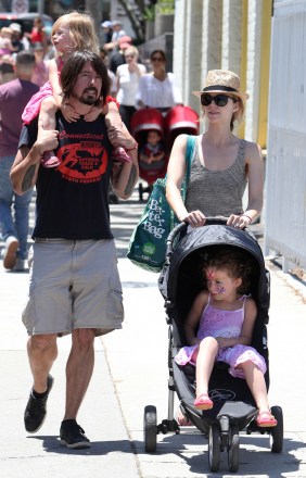 Dave Grohl with wife Jordyn Blum and daughters Violet Maye and Harper Willow
Dave Grohl and family in Studio City, Los Angeles, America - 17 Jul 2011
