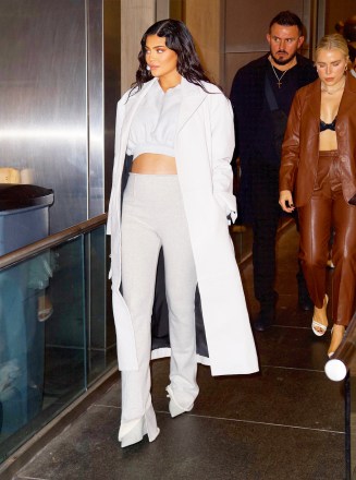 Kylie Jenner steps out to dinner at Nobu in a cropped gray ensemble with her baby bump on full display Kylie Jenner steps out to dinner at Nobu in a cropped gray ensemble with her baby bump on full display, New York, USA - 11 September 2021