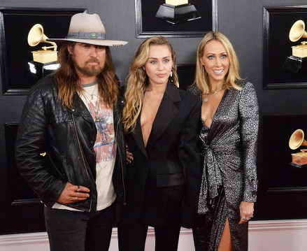 (L-R) Billy Ray Cyrus, Miley Cyrus and Tish Cyrus arrive for the 61st Annual Grammy Awards held at the Staples Center in Los Angeles on February 10, 2019 .Grammy Awards 2019, Los Angeles, California, United States - February 10, 2019