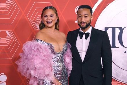 Chrissy Teigen, left, and John Legend arrive at the 74th annual Tony Awards at Winter Garden Theatre, in New York74th Annual Tony Awards, New York, United States - 26 Sep 2021