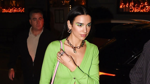 Dua Lipa Wears Miniskirt & Sweater With Nothing Underneath For Dinner With Gigi Hadid After Runway Debut