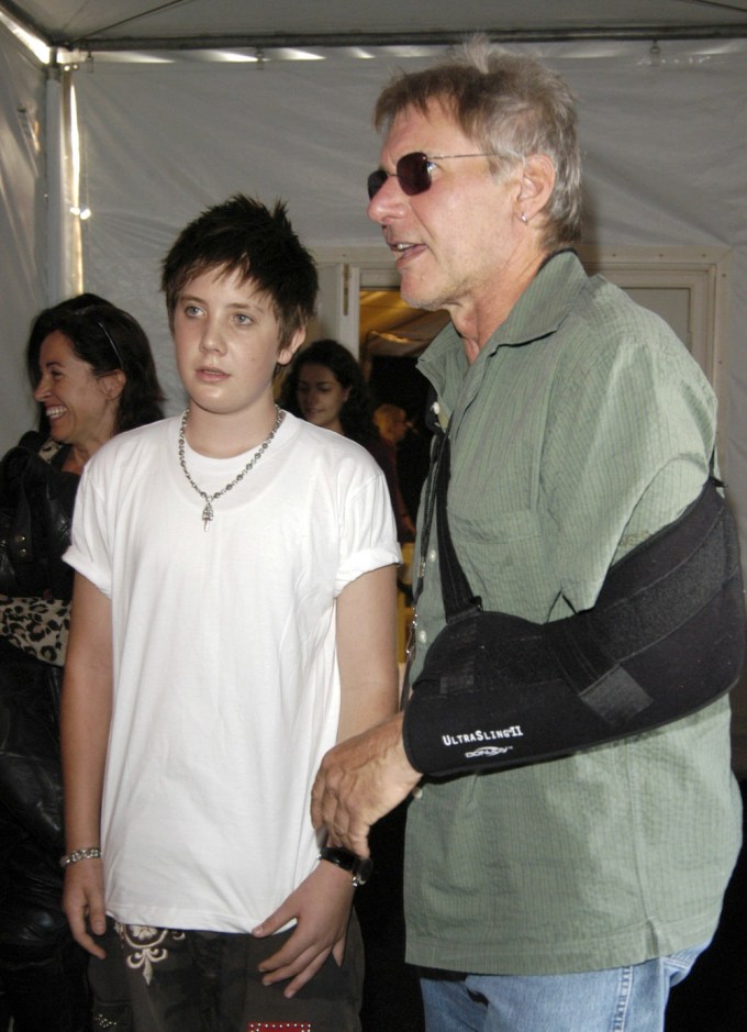 Harrison Ford & Son Malcolm Ford Attend A Fashion Show In 2003