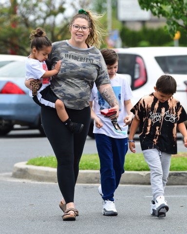 EXCLUSIVE: Pregnant Teen Mom Star Kailyn Lowry was spotted out in Delaware , shopping at Target with her three children . She showed off her baby bump with only a few weeks until the birth. She smiled as she walked into the store. Kaitlyn plans to raise all of her kids as a single mom following a split from her partner. They remained in the store for 20 minutes while the kids picked out water guns, while she bought a large pack of diapers to prepare for the baby's arrival . 10 Jun 2020 Pictured: Kailyn Lowry ,Lux Lowry, Isaac Rivera, Lincoln Marroquin. Photo credit: MEGA TheMegaAgency.com +1 888 505 6342 (Mega Agency TagID: MEGA679366_001.jpg) [Photo via Mega Agency]