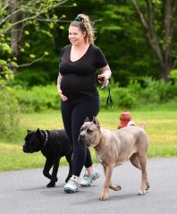 EXCLUSIVE: Teen Mom Star, Kailyn Lowry, was spotted showing off her growing baby bump while walking her dogs in Delaware. She recently split from her baby's father, and is planning to continue raising her kids on her own. She walked her massive Cane Corso puppies with no leash , wearing casual black workout gear. 27 May 2020 Pictured: Kailyn Lowry. Photo credit: MEGA TheMegaAgency.com +1 888 505 6342 (Mega Agency TagID: MEGA673363_001.jpg) [Photo via Mega Agency]