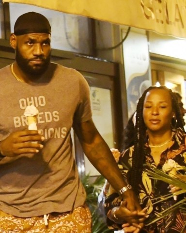 Ischia, ITALY  - *EXCLUSIVE*  - NBA star LeBron James grabs ice cream with his wife Savannah while in Ischia during his holiday tour of Italy,  James waved to a group of adoring fans as he headed back to his yacht.Pictured: LeBron JamesBACKGRID USA 5 SEPTEMBER 2021 BYLINE MUST READ: Cobra Team / BACKGRIDUSA: +1 310 798 9111 / usasales@backgrid.comUK: +44 208 344 2007 / uksales@backgrid.com*UK Clients - Pictures Containing ChildrenPlease Pixelate Face Prior To Publication*