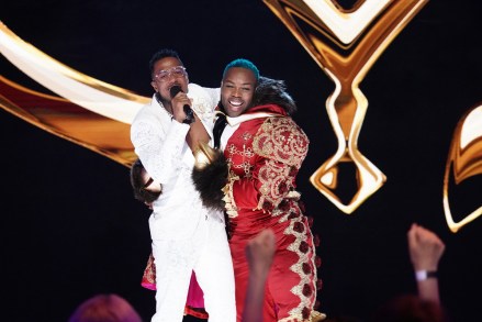 THE MASKED SINGER: L-R: Host Nick Cannon and Todrick Hall in the two-hour holiday themed Season Six Finale of THE MASKED SINGER airing Wednesday, Dec. 15 (8:00-10:00 PM ET/PT) on FOX. © 2022 FOX Media LLC. CR: Michael Becker / FOX