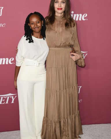 Zahara Jolie-Pitt, from left, and Angelina Jolie arrive at Variety's Power of Women: Los Angeles, at the Wallis Annenberg Center in Beverly Hills, Calif Variety's Power of Women: Los Angeles, Beverly Hills, United States - 30 Sep 2021