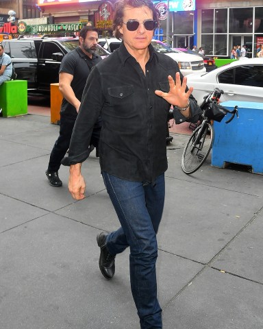 New York, NY - *EXCLUSIVE* - Tom Cruise greets his fans as he is seen arriving at AMC in Times Square. The actor has been in the city promoting his latest Mission impossible film and was all smiles as he arrived at the theater trailed by sister Lee and his son Connor. It was unclear if daughter Suri who lives in the city with Tom's ex Katie Holmes was invited to the event. Pictured: Tom Cruise, Connor Cruise BACKGRID USA 9 JULY 2023 BYLINE MUST READ: JosiahW / BACKGRID USA: +1 310 798 9111 / usasales@backgrid.com UK: +44 208 344 2007 / uksales@backgrid.com *UK Clients - Pictures Containing Children Please Pixelate Face Prior To Publication*