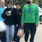 *EXCLUSIVE* Chris Martin and Dakota Johnson look happy after grabbing coffee and candy at SweetBu candy store