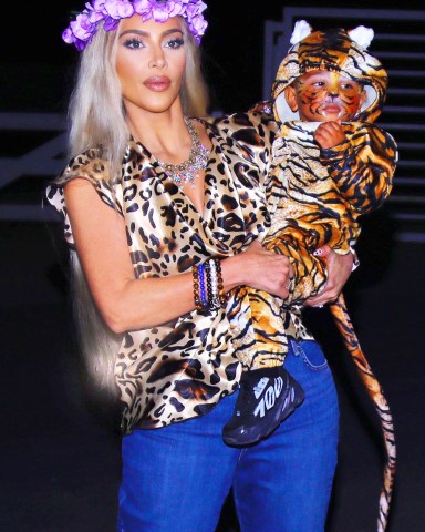 Kim Kardashian dresses up as Carole Baskin with her children, and Jonathan Cheban as Tiger King, Los Angeles, CA. 30 Oct 2020 Pictured: Kim Kardashian. Photo credit: MEGA TheMegaAgency.com +1 888 505 6342 (Mega Agency TagID: MEGA711379_001.jpg) [Photo via Mega Agency]