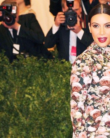 Kim Kardashian West
Costume Institute Gala Benefit celebrating the Punk: Chaos To Couture exhibition, Metropolitan Museum of Art, New York, America - 06 May 2013
KIM WEARING RICCARDO TISCI