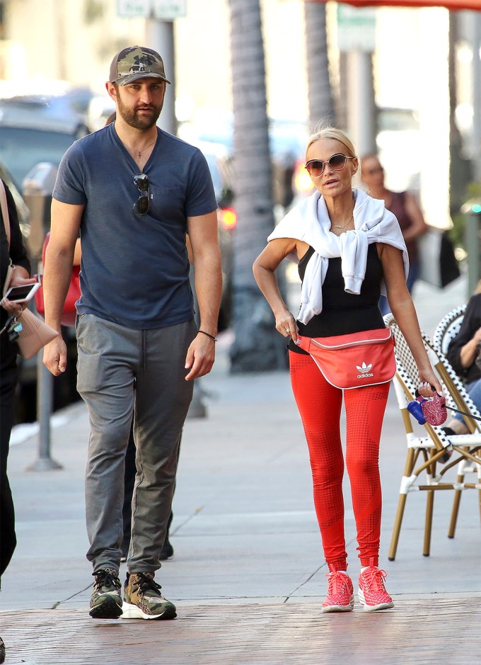Kristin Chenoweth walks her dog with boyfriend Josh Bryant