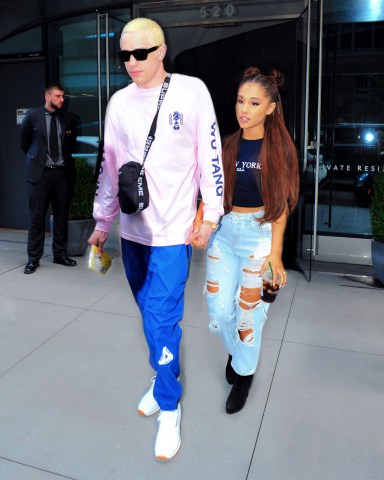 Ariana Grande and Pete Davidson look striking as they step out for concert in Brooklyn. 12 Jul 2018 Pictured: Ariana Grande and Pete Davidson. Photo credit: PC / MEGA TheMegaAgency.com +1 888 505 6342 (Mega Agency TagID: MEGA251293_001.jpg) [Photo via Mega Agency]