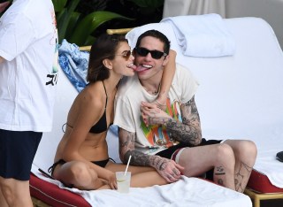 Kaia Gerber and Pete Davidson can't keep their tongues in their mouths as they make out nonstop in full view of all their friends at the pool in Miami. 23 Nov 2019 Pictured: Kaia Gerber; Pete Davidson. Photo credit: MEGA TheMegaAgency.com +1 888 505 6342 (Mega Agency TagID: MEGA555093_003.jpg) [Photo via Mega Agency]