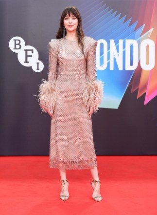 American actress Dakota Johnson attends the premiere of The Lost Daughter at the 65th BFI London Film Festival on October 13, 2021.Lost Daughter Premiere, London, England - 13 Oct 2021