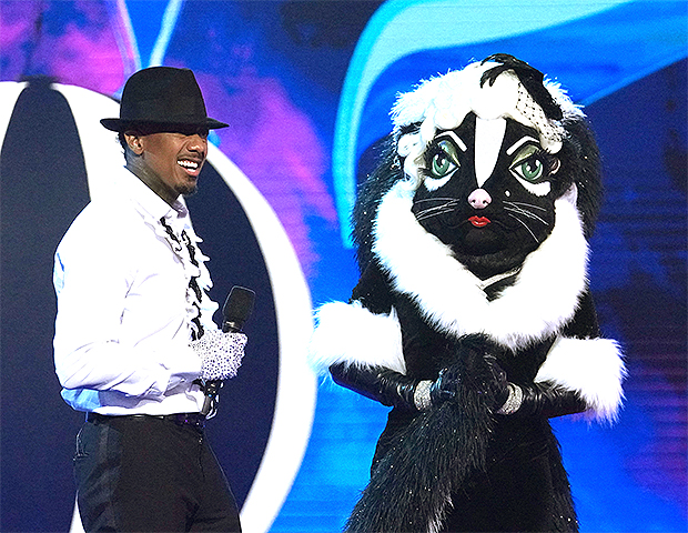 the masked singer skunk reveals a new clue with a pager watch hollywood life